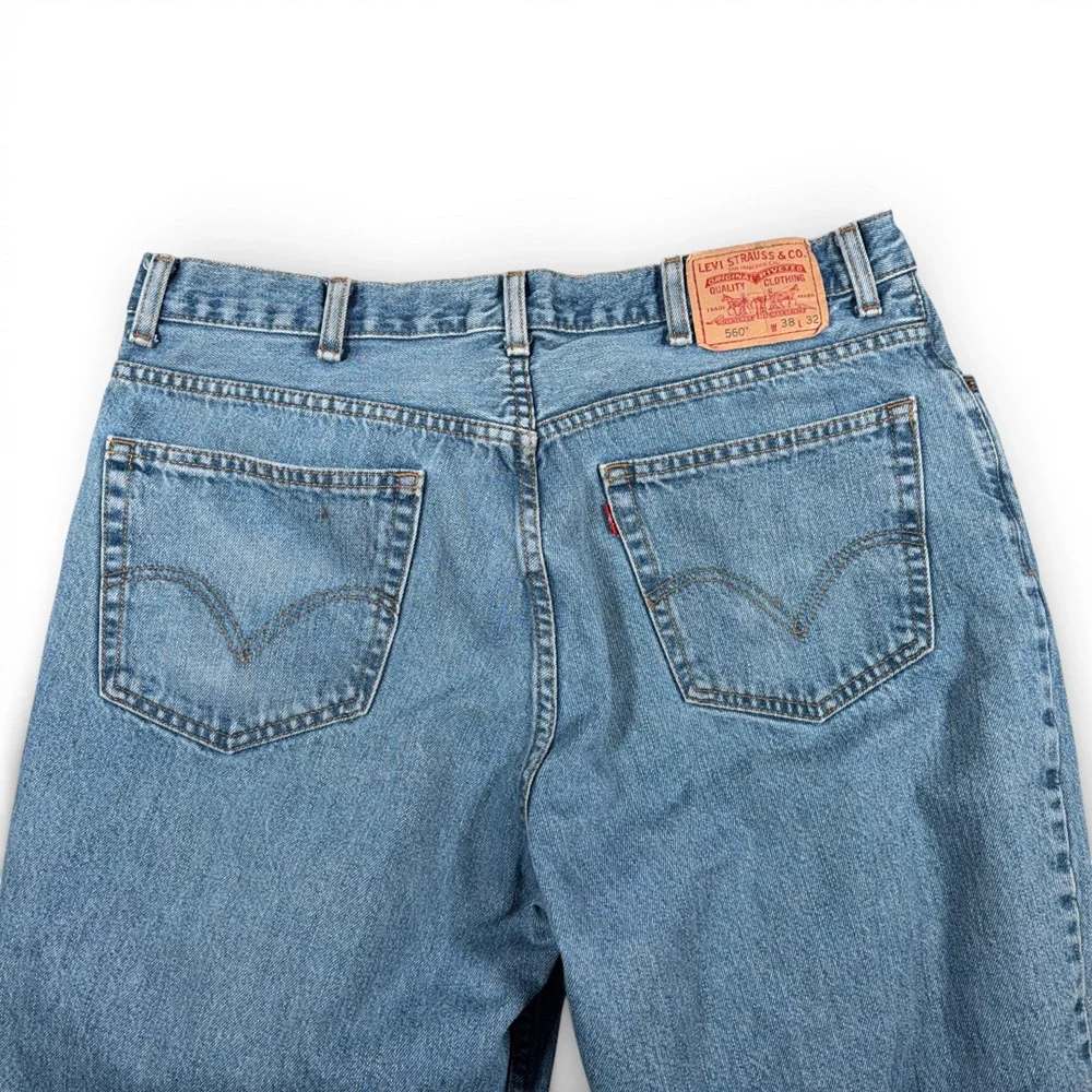 Vintage Levis Jeans Mens 38x32 Blue 560 Comfort Fit Light Wash Tapered Y2K